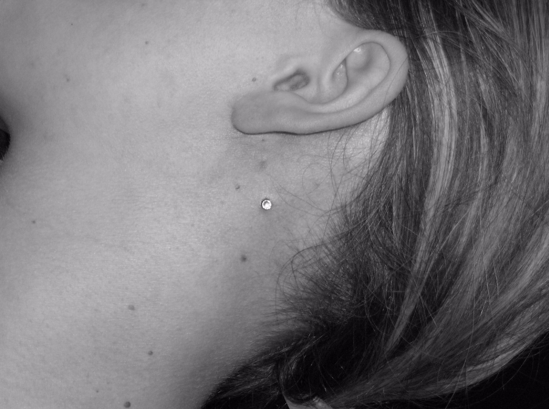 dermal piercing behind ear